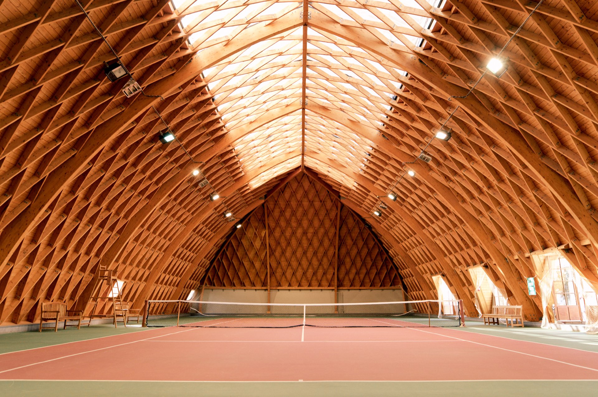 Inside view of the Tennis de la Cavalerie court, under its wooden framework.